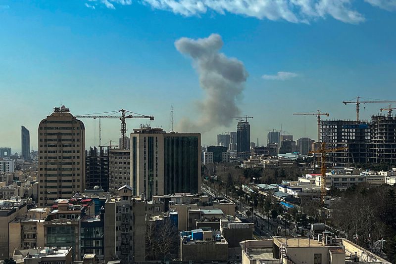 A plume of smoke rises following a reported explosion in Tehran on February 28, 2026. Israel's defence ministry announced February 28 it had launched a "preemptive strike" on Iran as sirens sounded in Jerusalem and people across the country received phone alerts about an "extremely serious" threat. (Photo by AFP via Getty Images)