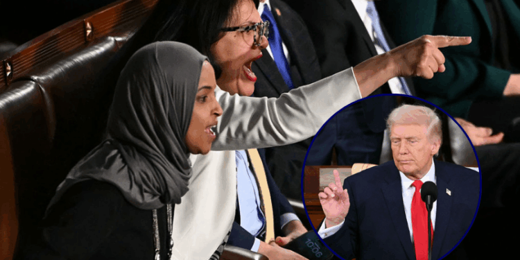 US President Donald Trump delivers the State of the Union address in the House Chamber of the US Capitol in Washington, DC, on February 24, 2026. (Photo by Brendan SMIALOWSKI / AFP via Getty Images) -- (L/R) US Representatives Ilhan Omar, Democrat from Minnesota, and Rashida Tlaib, Democrat from Michigan, shout as President Donald Trump delivers the State of the Union address in the House Chamber of the US Capitol in Washington, DC, on February 24, 2026. (Photo by ANDREW CABALLERO-REYNOLDS / AFP via Getty Images)