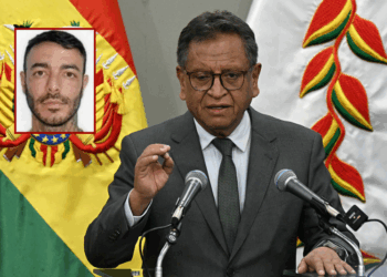 (Background) Bolivian Minister of Government Marco Antonio Oviedo delivers a press conference in La Paz, after Uruguayan alleged trug trafficker Sebastian Marset was arrested, on March 13, 2026. Notorious narco trafficker, Sebastian Marset, who eluded police across Latin America for years and was on the US most-wanted list, was arrested on March 13, 2026 in Bolivia, a government source told AFP. (Photo by AIZAR RALDES / AFP via Getty Images) / (L) Sebastian Enrique Marset Cabrera (via: Department of State; state.gov)