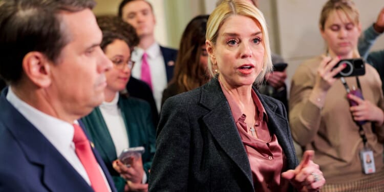 Attorney General Pam Bondi speaks with the media Wednesday at the Capitol in Washington, D.C. Bondi and Deputy Attorney General Todd Blanche provided members of the House Committee on Oversight and Government Reform with a private briefing regarding the Epstein files, but Democrats stormed out when they discovered there were no TV cameras present.