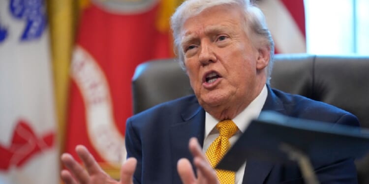 President Donald Trump speaks in the Oval Office on Monday after signing an executive order establishing a task force on fraud.