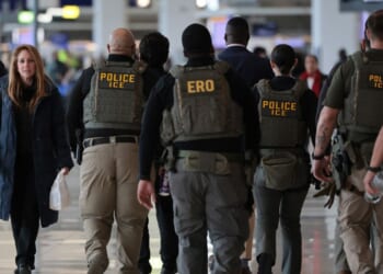 Immigration and Customs Enforcement agents patrol Terminal B at LaGuardia Airport on March 23, 2026, in New York City.