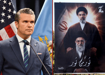 (L) US Secretary of Defense Pete Hegseth looks on during a joint press conference with Admiral Charles Bradford "Brad" Cooper II, Commander of US Central Command, at US Central Command (CENTCOM) headquarters at MacDill Air Force Base in Tampa, Florida, on March 5, 2026. (Photo by Octavio JONES / AFP via Getty Images) / (R) A photograph shows a billboard depicting Iran