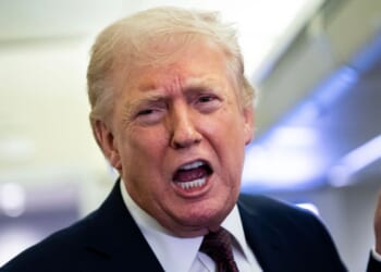 President Donald Trump speaks to media members onboard Air Force One on March 15, 2026.