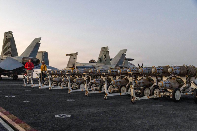 AT SEA, UNSPECIFIED - FEBRUARY 27: (EDITOR'S NOTE: This Handout image was provided by a third-party organization and may not adhere to Getty Images' editorial policy.) In this handout released by U.S. Central Command, U.S. Sailors transfer ordnance on the flight deck of Nimitz-class aircraft carrier USS Abraham Lincoln (CVN 72), on February 27, 2026 in the Arabian Sea. Iran's Supreme Leader, Ayatollah Ali Khamenei, was confirmed killed after the United States and Israel launched a joint attack on Iran on February 28. Iran retaliated by firing waves of missiles and drones at Israel, and targeting U.S. allies in the region. (Photo by U.S. Central Command via Getty Images)