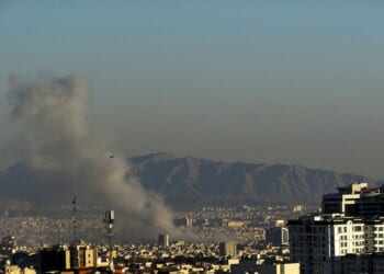 Plumes of smoke rise following reported explosions in Tehran on March 3, 2026, after Iran