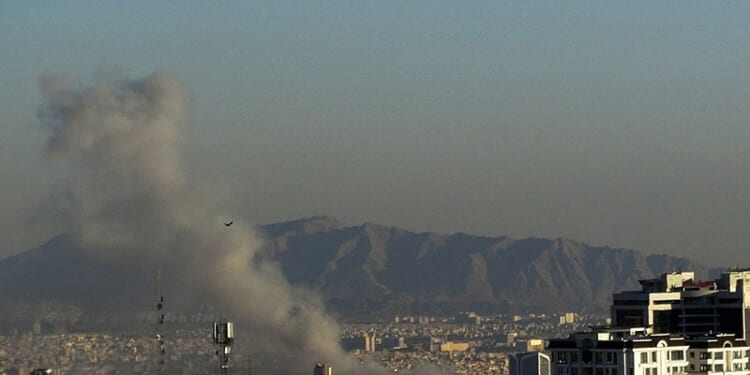 Plumes of smoke rise following reported explosions in Tehran on March 3, 2026, after Iran