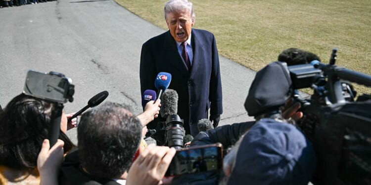President Donald Trump speaks to the news media on the South Lawn of the White House in Washington, D.C., in a file photo taken Feb. 27.