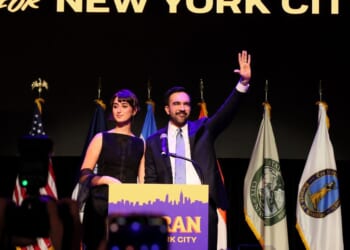 New York City Democratic Mayor Zohran Mamdani waves with his wife, Rama Duwaji, after delivering remarks at his election night watch party at the Brooklyn Paramount on Nov. 4, 2025, in the Brooklyn borough of New York City.