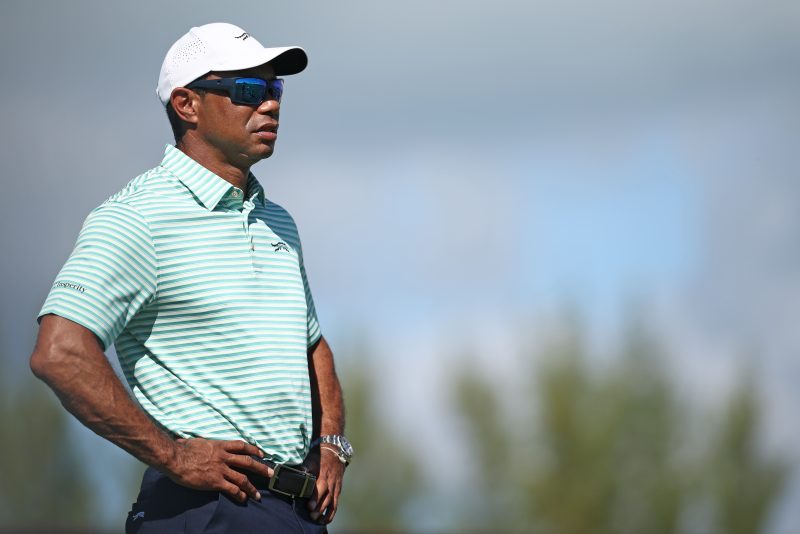 NASSAU, BAHAMAS - DECEMBER 06: Tiger Woods of the United States looks on from the driving range ahead of the third round of the Hero World Challenge 2025 at Albany Golf Course on December 06, 2025 in Nassau, Bahamas. (Photo by Jared C. Tilton/Getty Images)