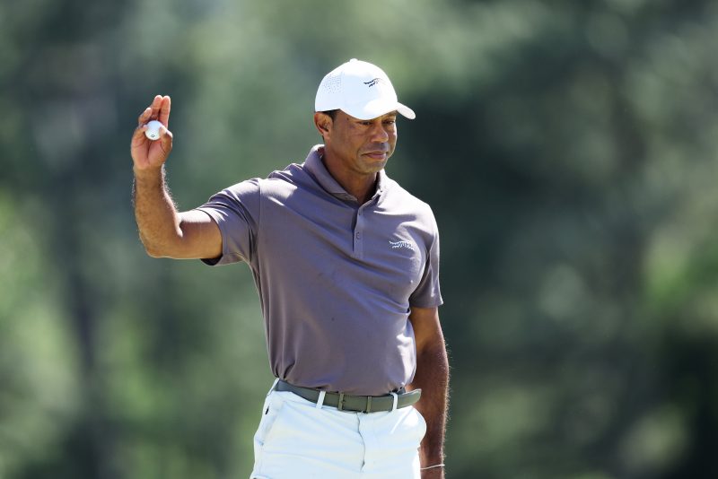 AUGUSTA, GEORGIA - APRIL 12: Tiger Woods of the United States reacts on the 18th green during the second round of the 2024 Masters Tournament at Augusta National Golf Club on April 12, 2024 in Augusta, Georgia. (Photo by Warren Little/Getty Images)