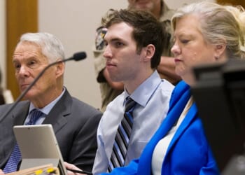 PROVO, UTAH - JANUARY 16: Tyler Robinson, center, accused in the fatal shooting of Charlie Kirk, appears during a hearing in 4th District Court on January 16, 2026 in Provo, Utah. Prosecutors have charged Tyler Robinson with aggravated murder and plan to seek the death penalty. (Photo by Bethany Baker-Pool/Getty Images)