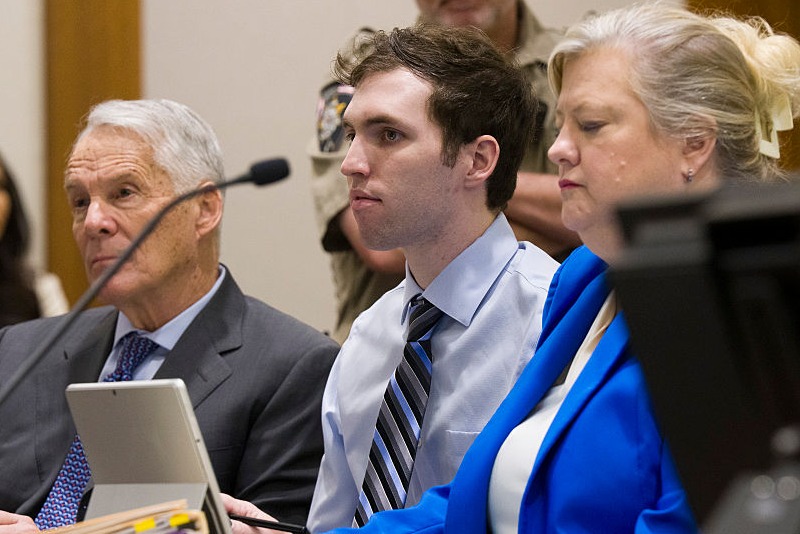 PROVO, UTAH - JANUARY 16: Tyler Robinson, center, accused in the fatal shooting of Charlie Kirk, appears during a hearing in 4th District Court on January 16, 2026 in Provo, Utah. Prosecutors have charged Tyler Robinson with aggravated murder and plan to seek the death penalty. (Photo by Bethany Baker-Pool/Getty Images)