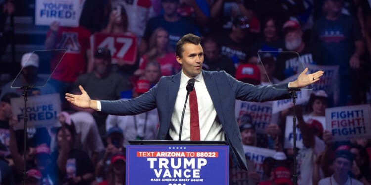 Turning Point USA founder Charlie Kirk speaks during a campaign rally for President Donald Trump at Desert Diamond Arena on Aug. 23, 2024, in Glendale, Arizona.
