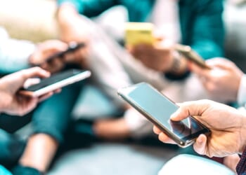 Stock photo of people on smartphones