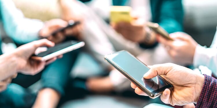 Stock photo of people on smartphones