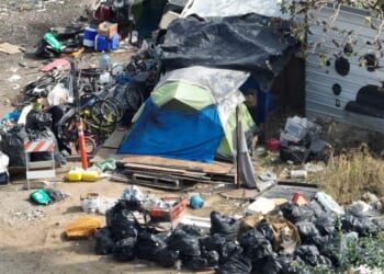 A view of trash, RVs, and a homeless encampment in downtown Los Angeles on Oct. 25, 2025.
