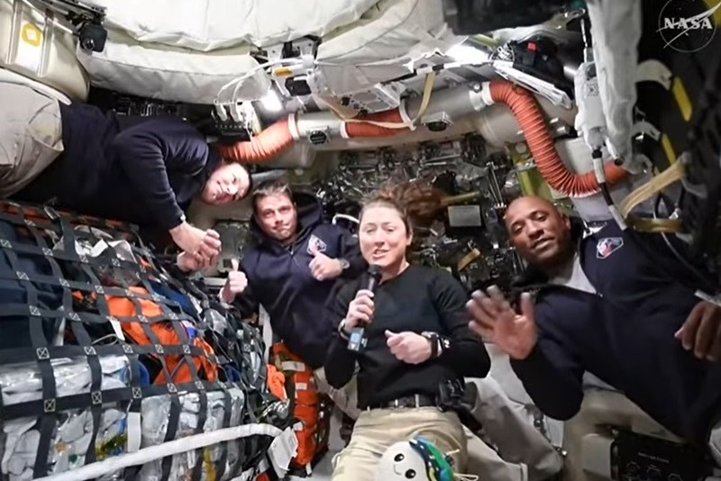 Artemis II crew members Jeremy Hansen, Reid Wiseman, Christina Koch, and Victor Glover answer questions from reporters during the first downlink event of their mission.