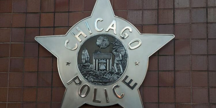 Suspect in custody, 1 police officer killed, other in critical condition, after shooting at Chicago hospital – One America News Network