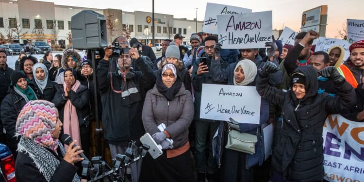 Rep. Ilhan Omar speaks during a rally at the Amazon fulfillment center in Shakopee, Minnesota, on Dec. 14, 2018.