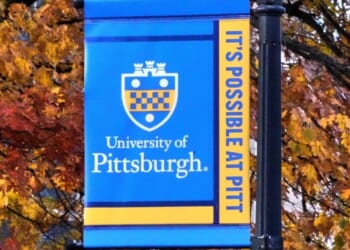 Banners fly on the campus of the University of Pittsburgh in Pittsburgh on Nov. 10, 2025.