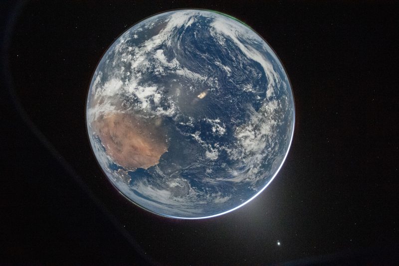 NASA astronaut and Artemis II Commander Reid Wiseman took this picture of Earth from the Orion spacecraft's window on April 2, 2026, after completing the translunar injection burn.