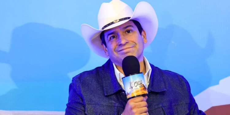 Bobby Pulido, singer and candidate for the 15th District in Texas, speaks at a news conference during La Cura Fest by Carin Leon at Expogan on March 15, 2026, in Hermosillo, Mexico.