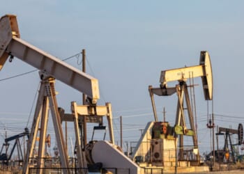 Oil drills extract oil in Lost Hills Oil Field in California.