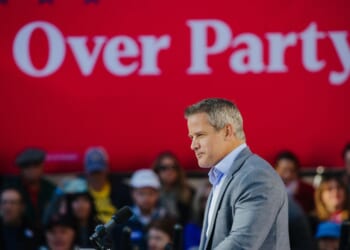 Former Rep. Adam Kinzinger speaks during a rally for Vice President Kamala Harris in Washington Crossing, Pennsylvania, on Wednesday, Oct. 16, 2024.