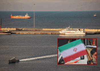 (Background) A police speed boat patrols the port as oil tankers and high speed crafts sit anchored at Muscat Anchorage near the Strait of Hormuz on March 30, 2026 in Muscat, Oman. Several Chinese-owned vessels were reportedly able to transit the Strait of Hormuz today, the day after U.S. President Donald Trump said Iran would allow 20 ships to cross through the vital waterway. Maritime traffic through the Strait of Hormuz, which conveys about a fifth of the world