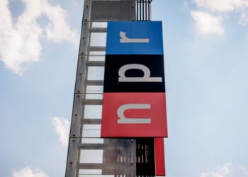 A sign outside the National Public Radio headquarters on July 22, 2025 baring the NPR logo in Washington, DC.