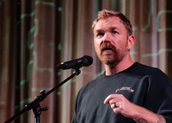 Graham Platner speaks at a town hall at the Leavitt Theater on Oct. 22, 2025, in Ogunquit, Maine.