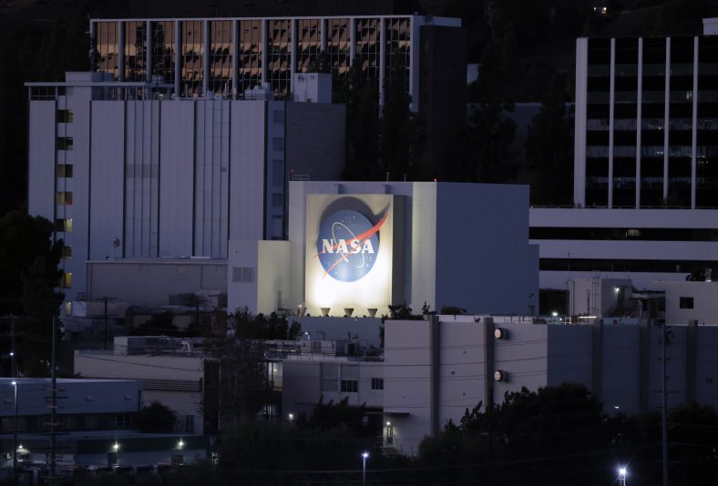 LA CAÑADA FLINTRIDGE, CALIFORNIA - OCTOBER 15: The NASA logo is displayed at NASA’s Jet Propulsion Laboratory on October 15, 2025 in La Cañada Flintridge, California. Around 550 people, or over ten percent of the famed lab’s workforce, are being laid off as part of an ongoing reorganization following two rounds of large layoffs last year. Layoffs at the laboratory, which is funded by NASA and managed by CalTech, are not related to the federal government shutdown. (Photo by Mario Tama/Getty Images)