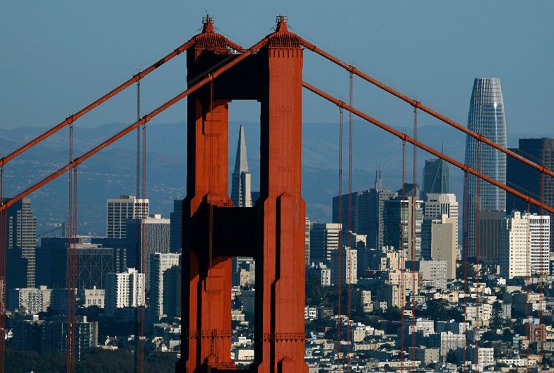 SAUSALITO, CALIFORNIA - OCTOBER 20: An aerial view of the Golden Gate Bridge in front of the San Francisco skyline on October 20, 2025 in Sausalito, California. During a television interview with Fox News’ Maria Bartiromo, U.S. President Donald Trump said he is considering sending National Guard troops to San Francisco. (Photo by Justin Sullivan/Getty Images)