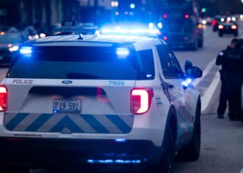 Chicago Police Department officers respond to the scene of an incident on March 29, 2022.