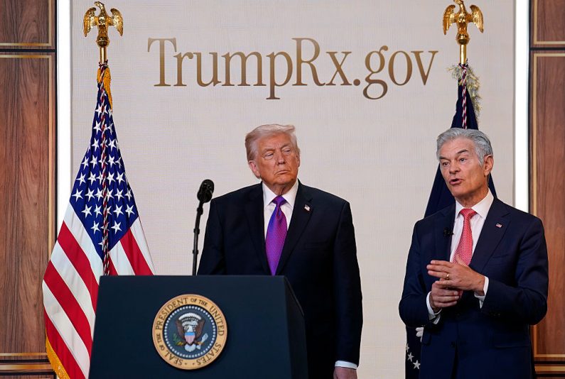 WASHINGTON, DC - FEBRUARY 5: Administrator for the Centers for Medicare & Medicaid Services Mehmet Oz speaks as U.S. President Donald Trump looks on during an event on drug pricing in the South Court Auditorium on the White House campus on February 5, 2026 in Washington, DC. The president announced the launch of TrumpRx, which the White House said would help lower prescription drug prices. (Photo by Nathan Howard/Getty Images)