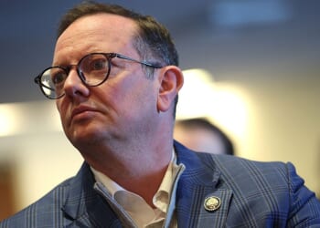 WASHINGTON, DC - JANUARY 20: U.S. Rep. Eric Burlison (R-MO) listens to witness testimony from the 1996 Brazilian UFO incident known as the "Roswell of Brazil" during a press conference on UAP and UFO encounters at the National Press Club on January 20, 2026 in Washington, DC. The press conference, organized by filmmaker James Fox and focused on the 1996 alleged UFO crash in Brazil, called for expanded whistleblower protection and greater transparency to the public. (Photo by Kevin Dietsch/Getty Images)