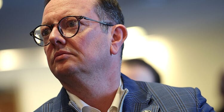 WASHINGTON, DC - JANUARY 20: U.S. Rep. Eric Burlison (R-MO) listens to witness testimony from the 1996 Brazilian UFO incident known as the "Roswell of Brazil" during a press conference on UAP and UFO encounters at the National Press Club on January 20, 2026 in Washington, DC. The press conference, organized by filmmaker James Fox and focused on the 1996 alleged UFO crash in Brazil, called for expanded whistleblower protection and greater transparency to the public. (Photo by Kevin Dietsch/Getty Images)