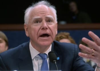 Minnesota Gov. Tim Walz, seen in a March 4 photo, tried to take partial credit for the raid, only to get called out by those who recall what actually happened.