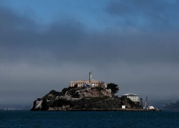 SAN FRANCISCO, CALIFORNIA - JULY 02: A view of Alcatraz Island on July 02, 2025 in San Francisco, California. U.S. President Donald Trump renewed his plans to reopen the tourist attraction Alcatraz prison as a working federal penitentiary. In a Truth Social post on Tuesday, President Trump said that conceptual work to renovate the prison had begun six months ago, and several prison development firms have been involved in preliminary planning. (Photo by Justin Sullivan/Getty Images)