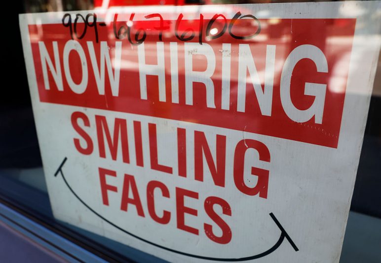 PASADENA, CALIFORNIA - MARCH 06: A "Now Hiring" sign is posted in a shop on March 6, 2026 in Pasadena, California. According to the Bureau of Labor Statistics, the U.S. economy lost 92,000 jobs in February while the unemployment rate ticked up to 4.4 percent. (Photo by Mario Tama/Getty Images)