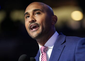 Rep. Shomari Figures, an Alabama Democrat seen on the campaign trail in 2024, appeared surprised at the crowd's response to his question Monday night at a town hall meeting. near Mobile