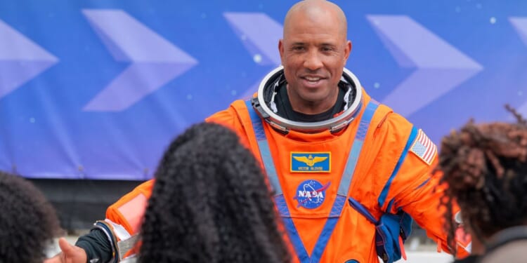 Pilot Victor Glover speaks to his family as he walks out of the Neil A. Armstrong Operations and Checkout Building just before the launch of Artemis II at NASA's Kennedy Space Center on April 1, 2026.