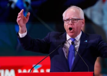 Minnesota's Democratic Gov. Tim Walz delivers a speech Saturday at the Global Progressive Mobilization summit in Barcelona, Spain.