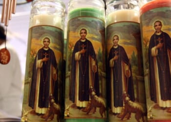 Candles depicting former President Barack Obama as a saint stand displayed at "Just For Fun" in San Francisco, California, on March 2, 2009.