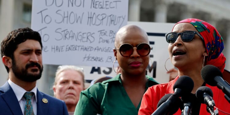 Rep. Ilhan Omar addresses a rally with Rep. Greg Casar and other Democratic members of the House of Representatives to voice their opposition to President Joe Biden's new policy on asylum during a rally with members of CASA, an immigrant and minority advocacy group, outside the U.S. Capitol on June 4, 2024, in Washington, D.C.